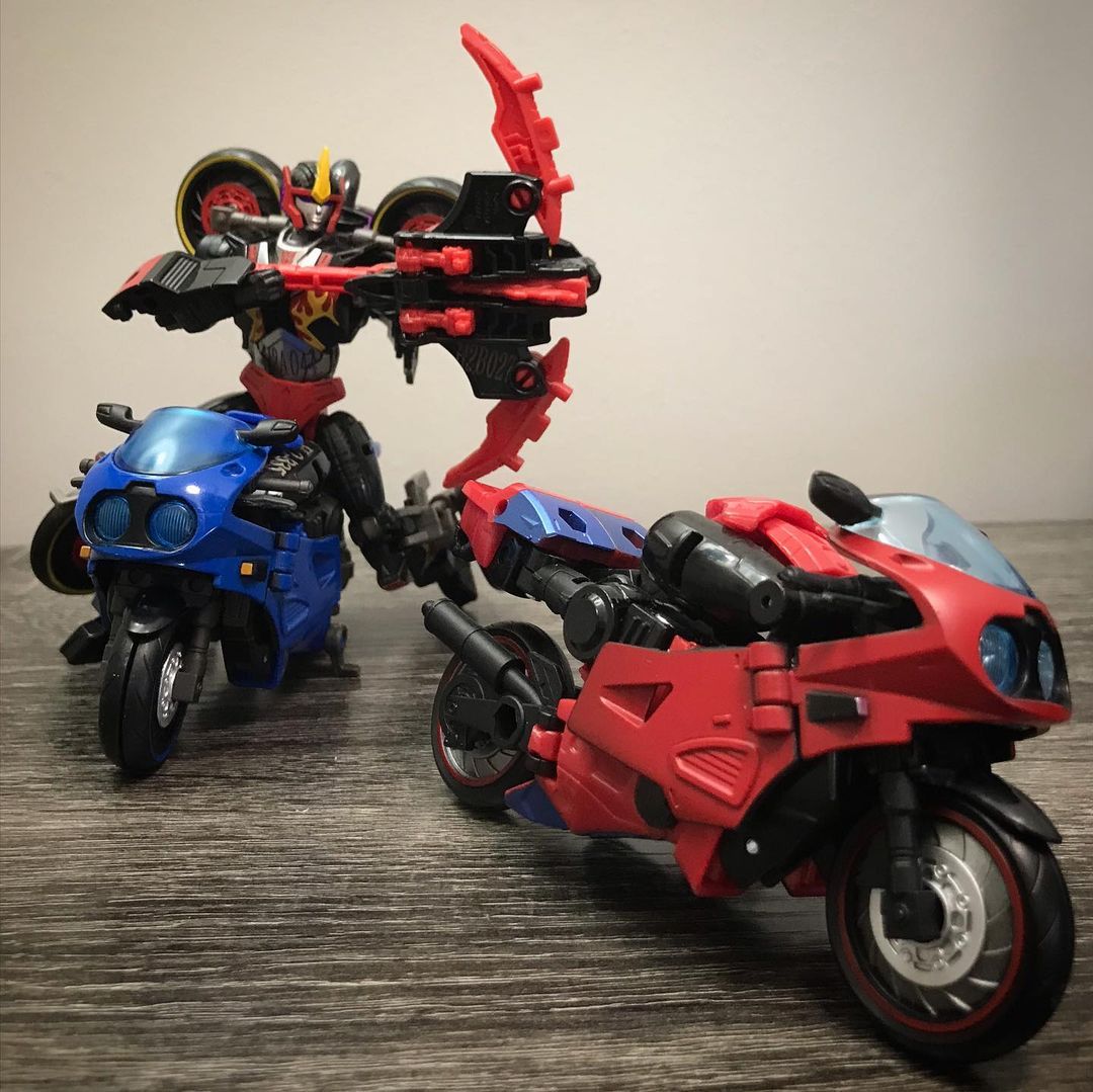Shattered Glass Decepticon Flamewar and Fireglide Concept